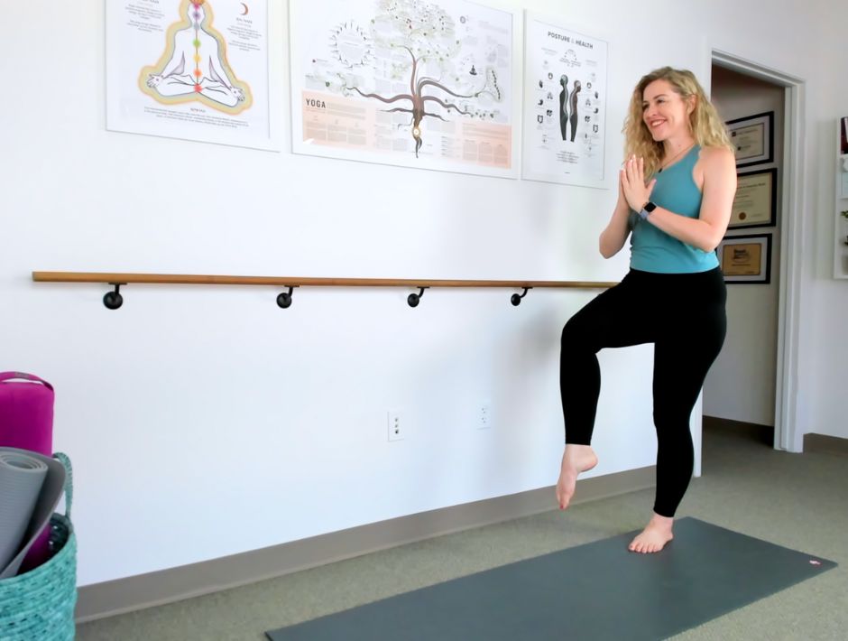 Mikah Horn, yoga therapist, demonstrating the single leg balance for fall prevention.